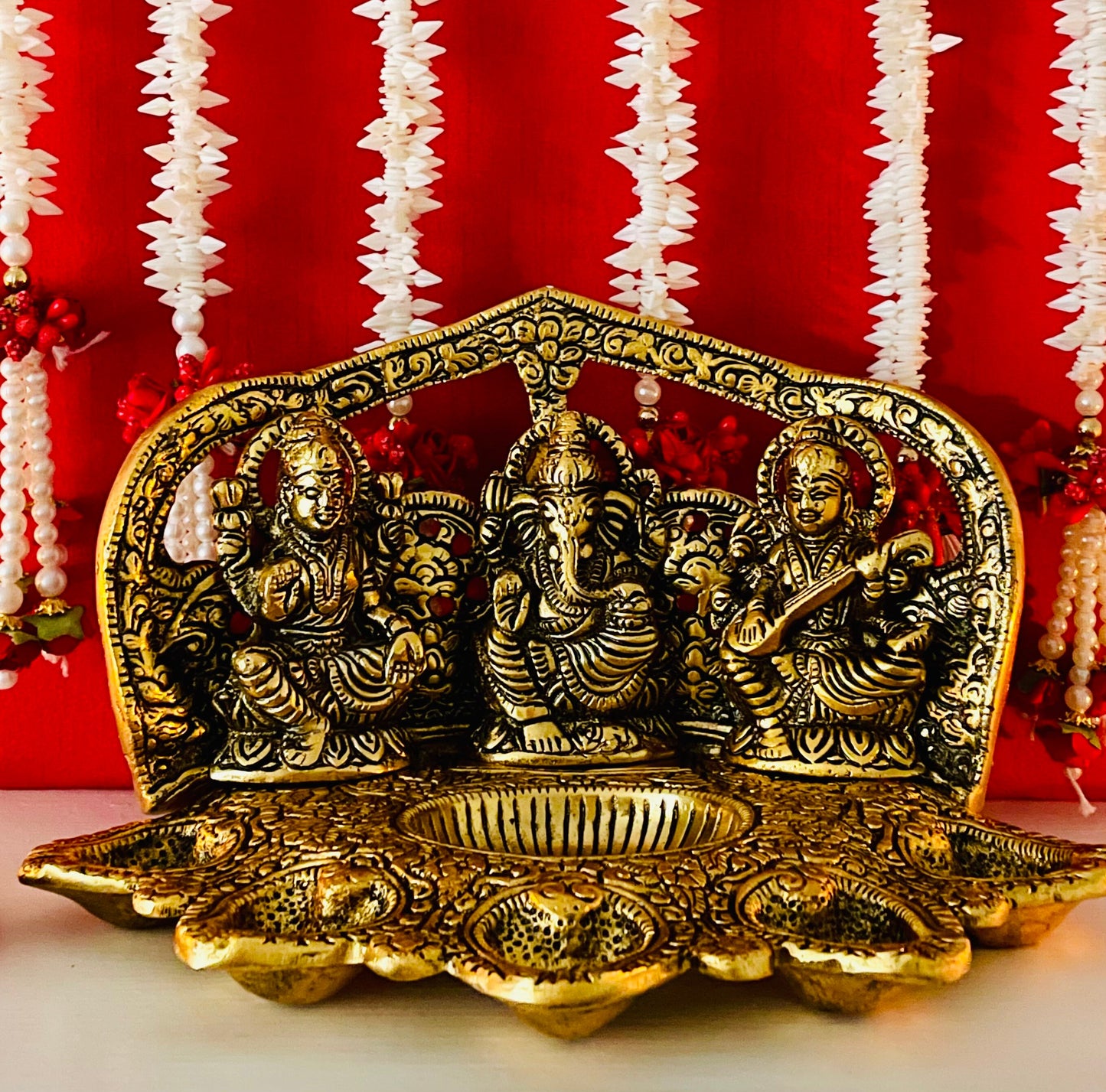 Lakshmi Ganesh Saraswati Figurines Sitting on a pedestal Metal Figurines with Ornate Oxidised Gold look Diwali Gifting Housewarming