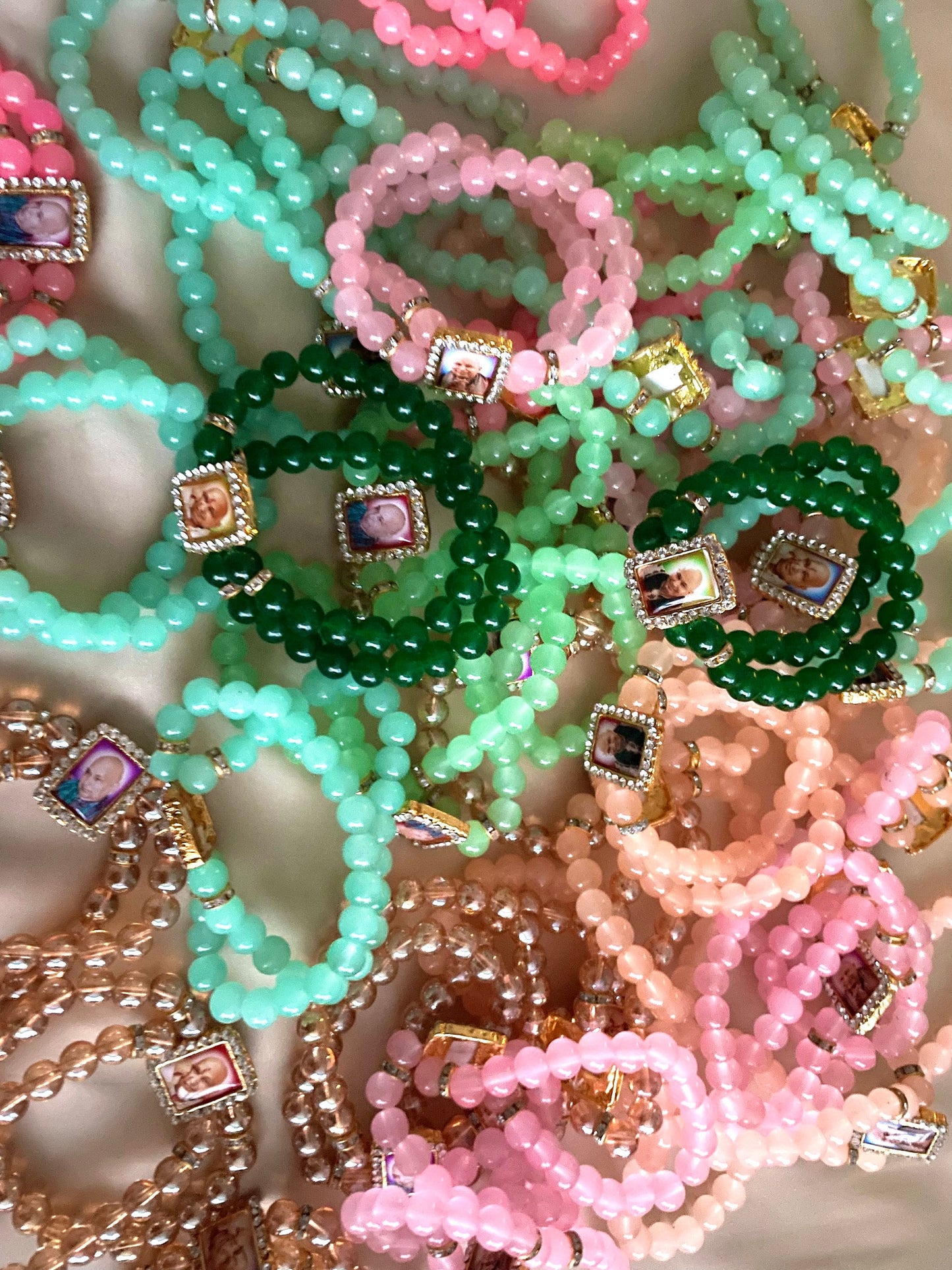 Guruji Return Gifts Favours Bracelets pastel beads with Guru ji Photo motif